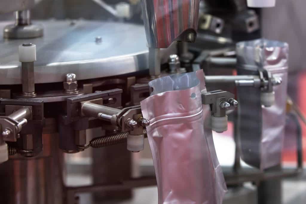 Ready2Eat Food Packaging Machine Food packaging machine in operation for ready-to-eat products.